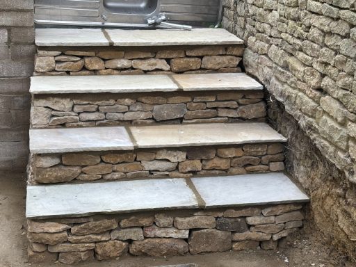 Cotswold stone steps with sandstone treads